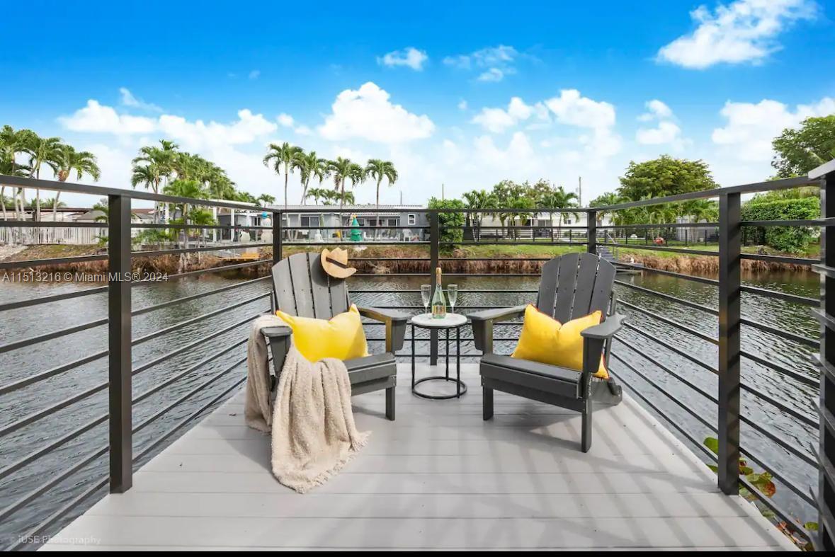 a view of a swimming pool with a lounge chairs