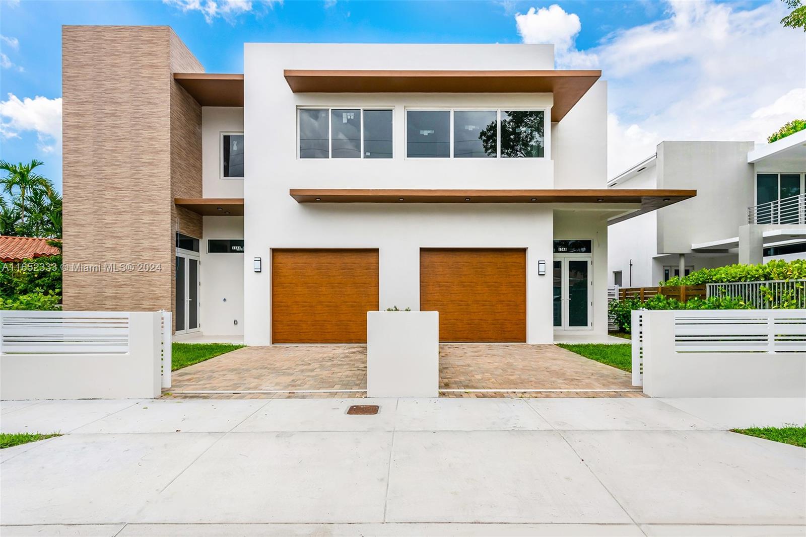 a view of house with backyard and outdoor space