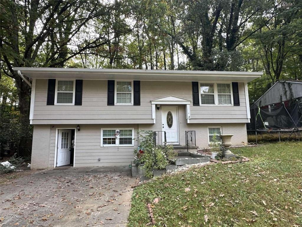 front view of a house with a yard