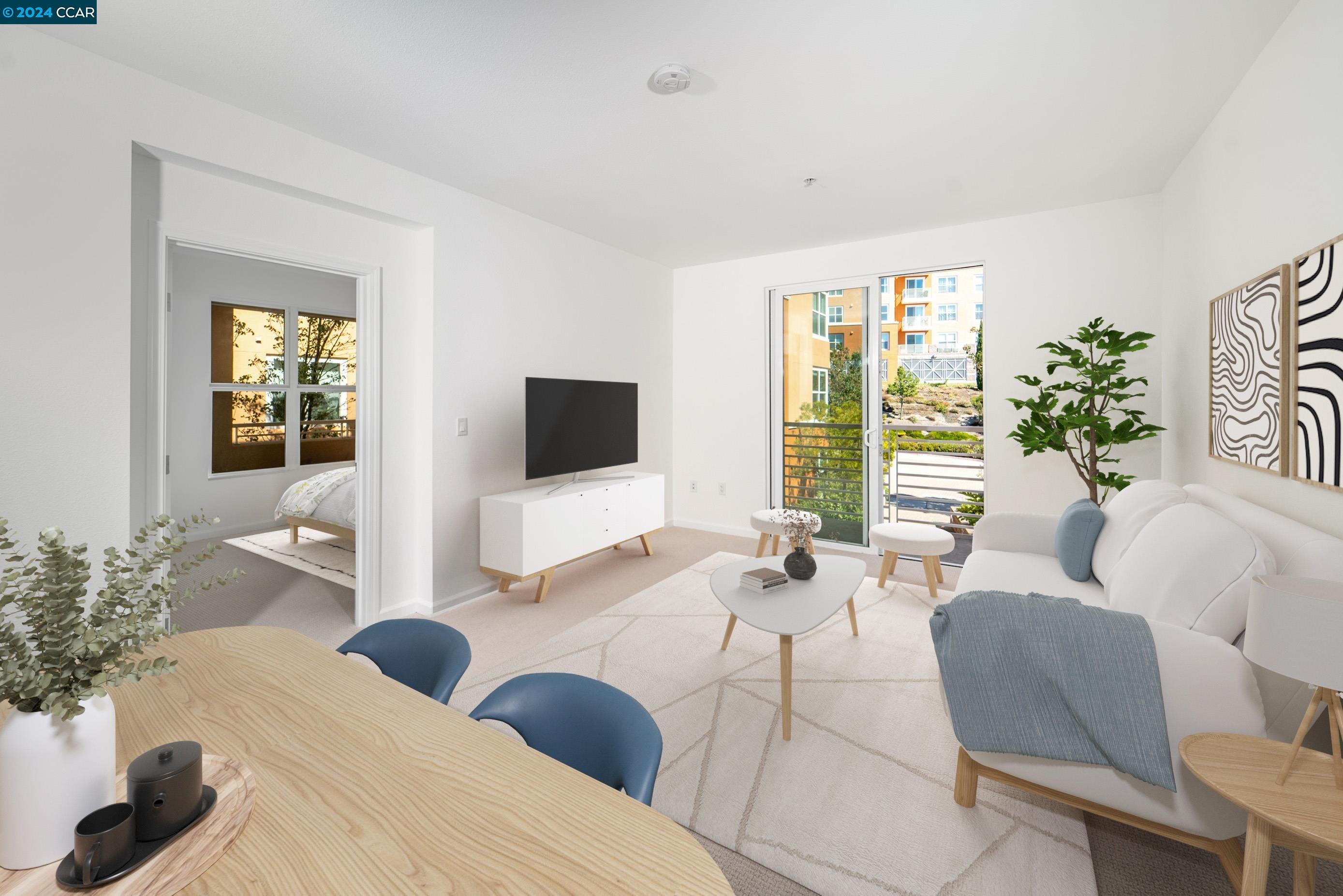 a living room with furniture and flat screen tv