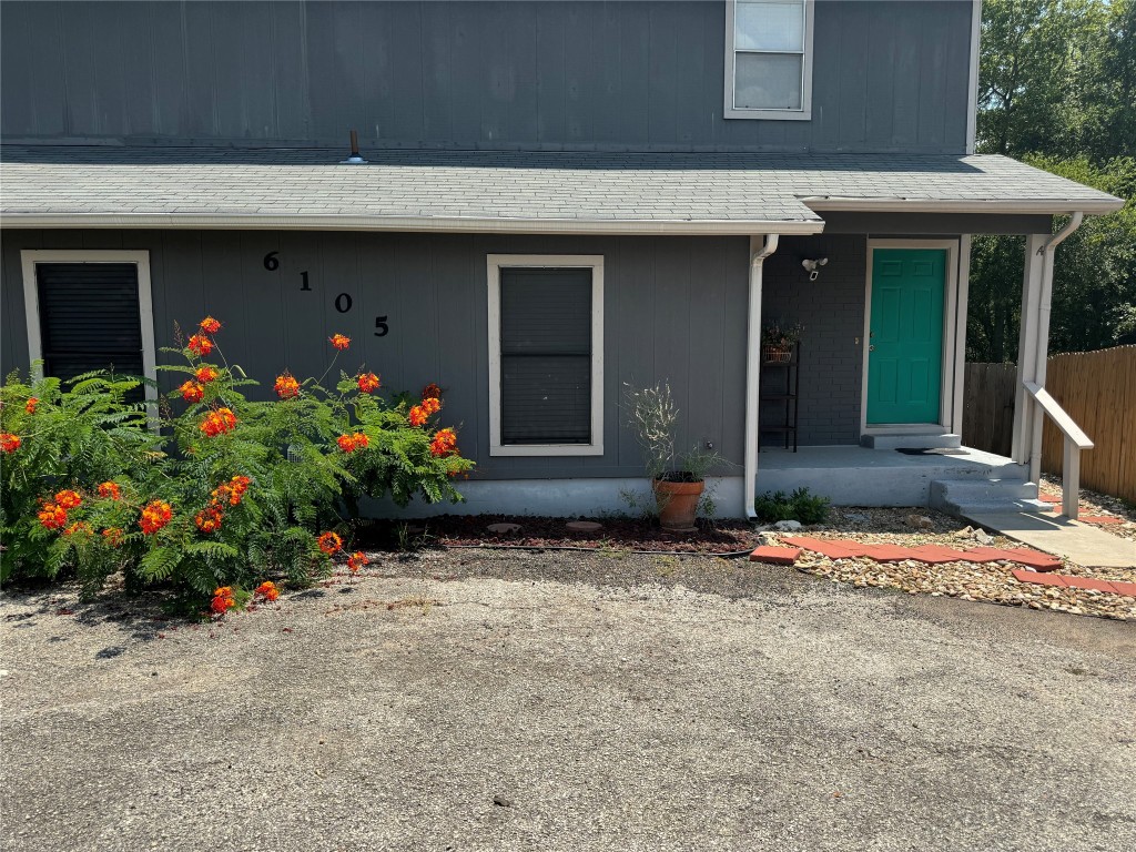 a front view of a house with a porch