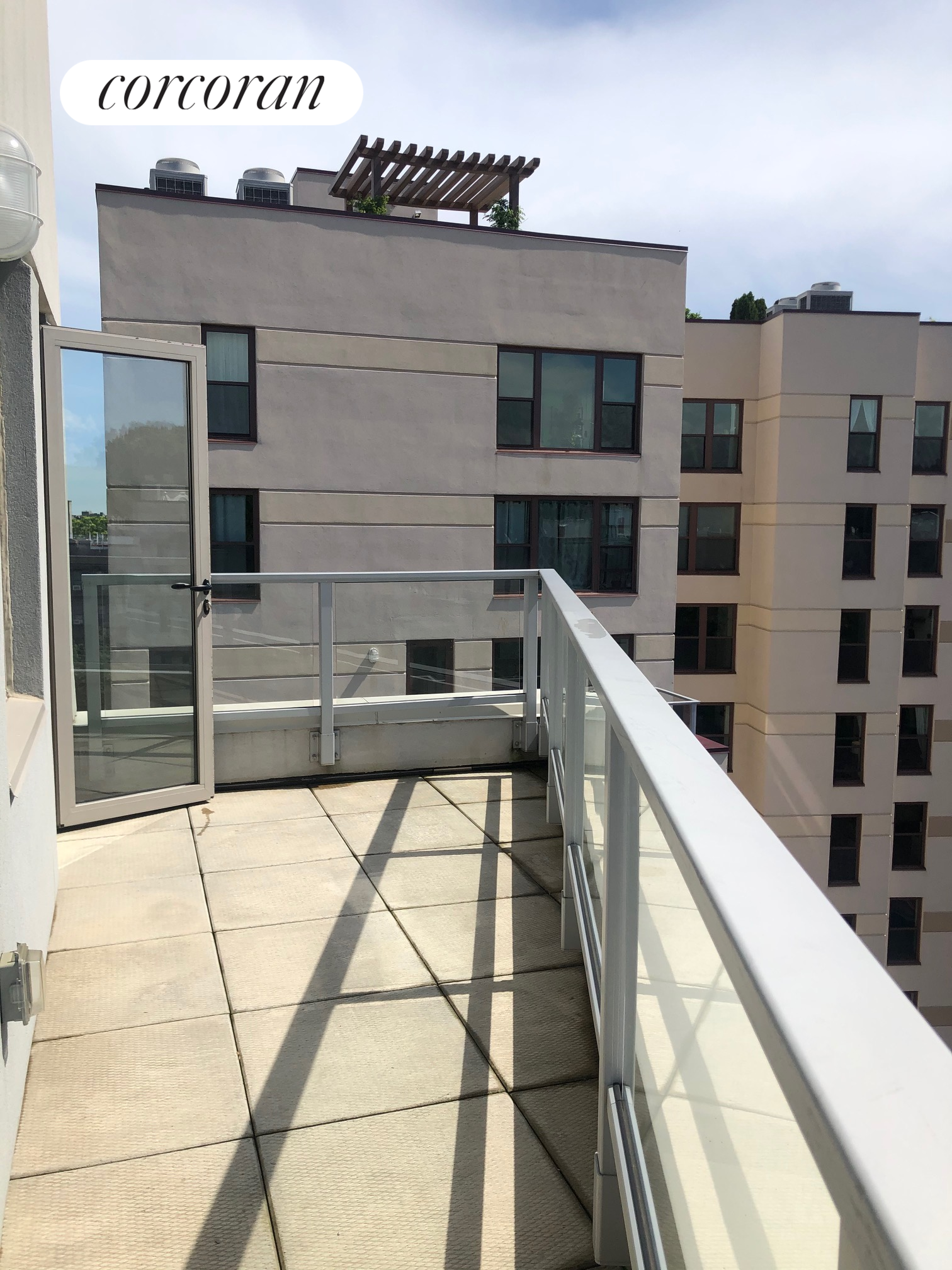 a view of balcony with a large window