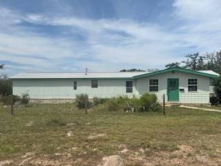 front view of house with a yard