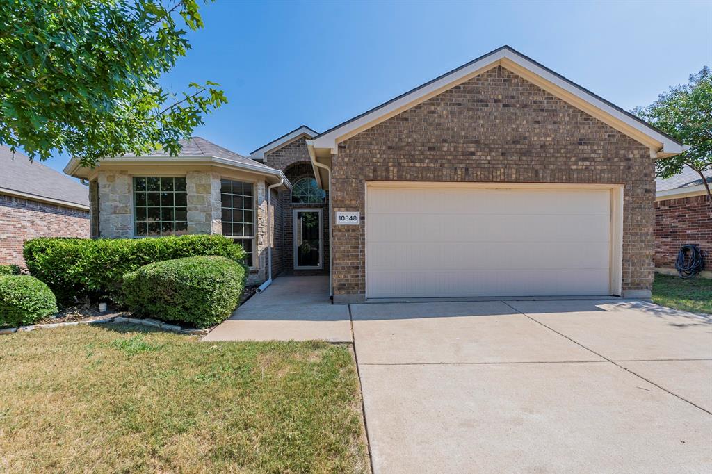 a view of a house with garage