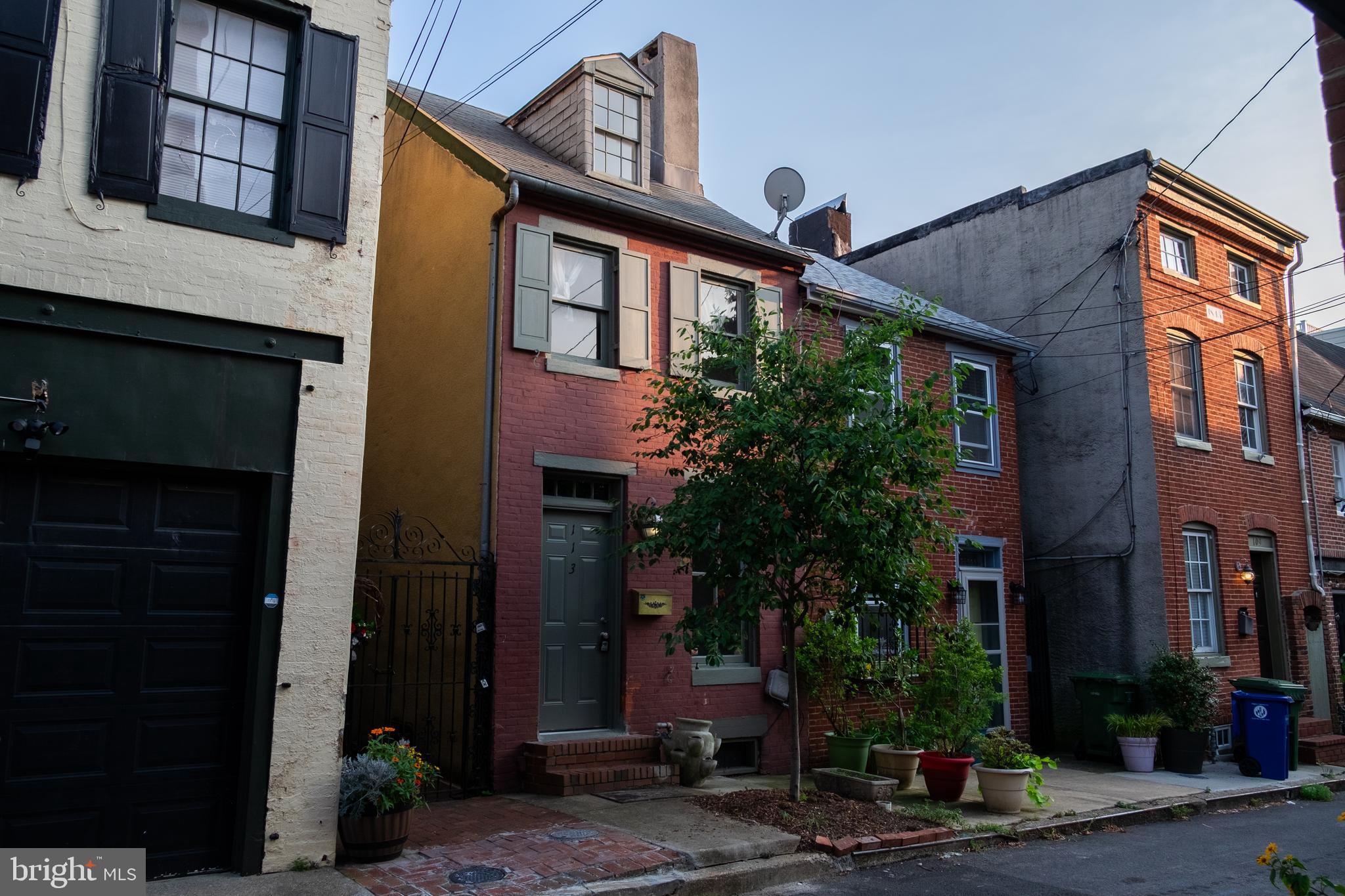 a front view of a building with street view