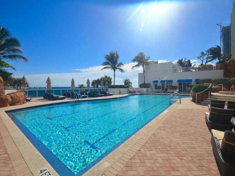 a view of a swimming pool and a terrace