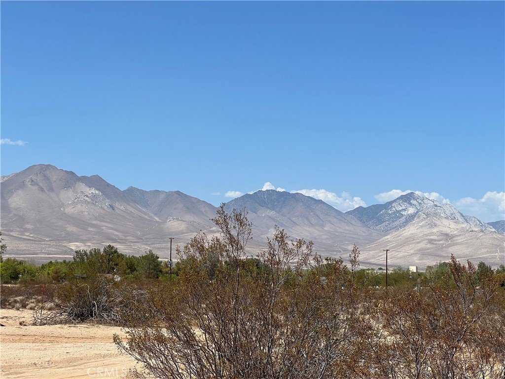 a view of mountains and valleys