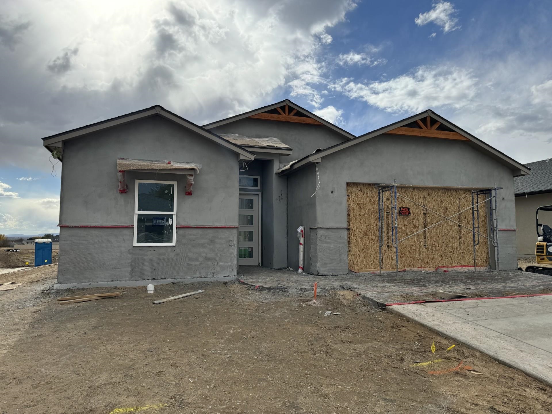 a house with white door of garage