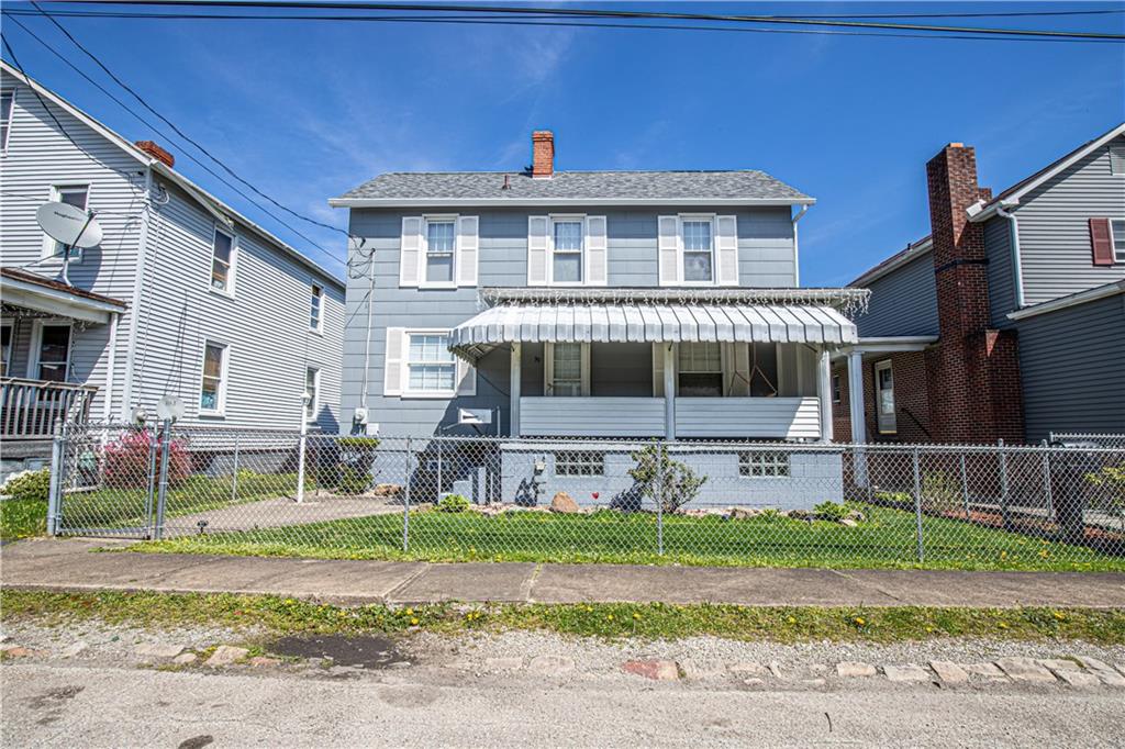 a front view of house with yard