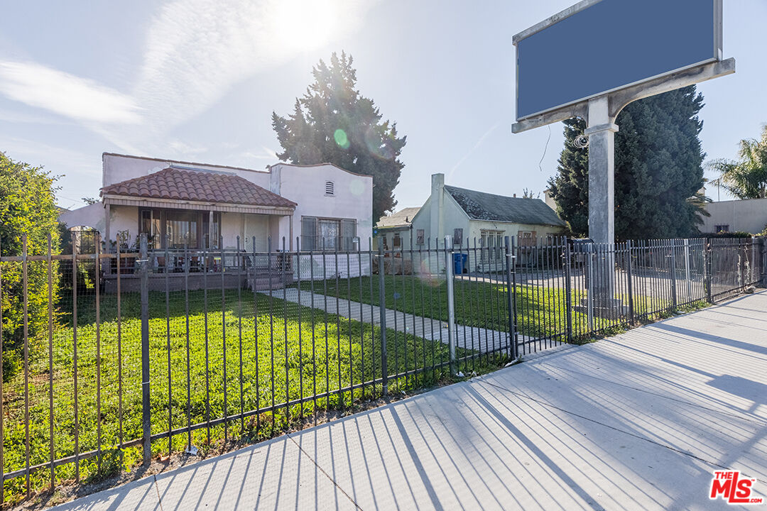 a view of a house with swimming pool