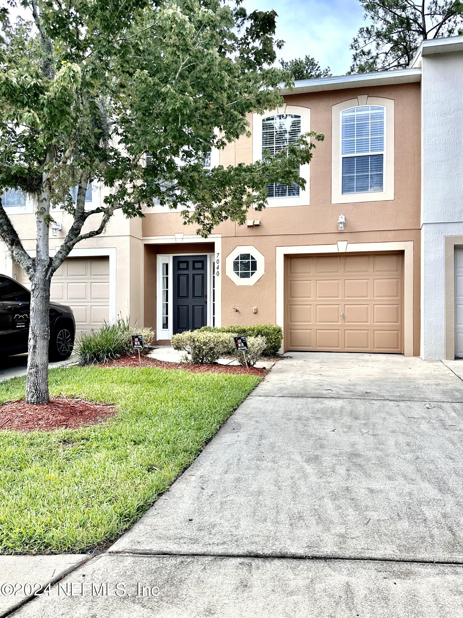 a front view of house with yard