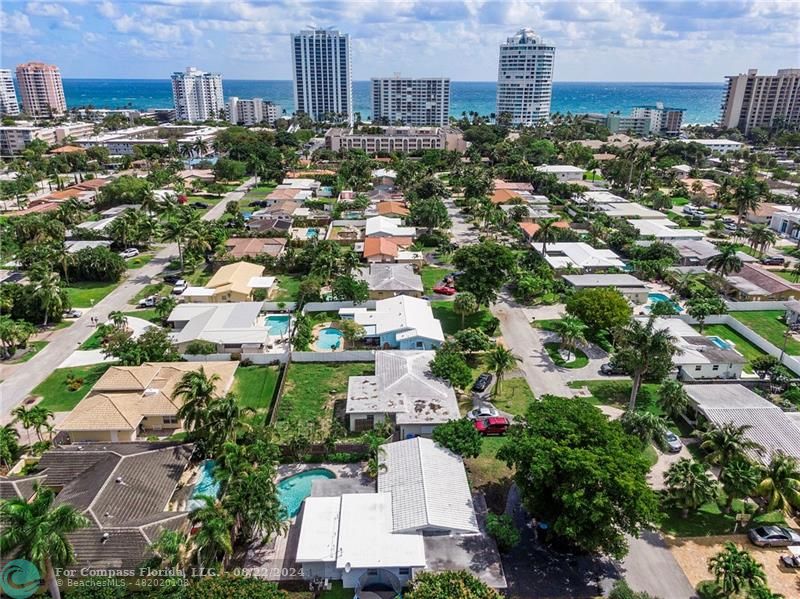 an aerial view of a city with lots of residential buildings