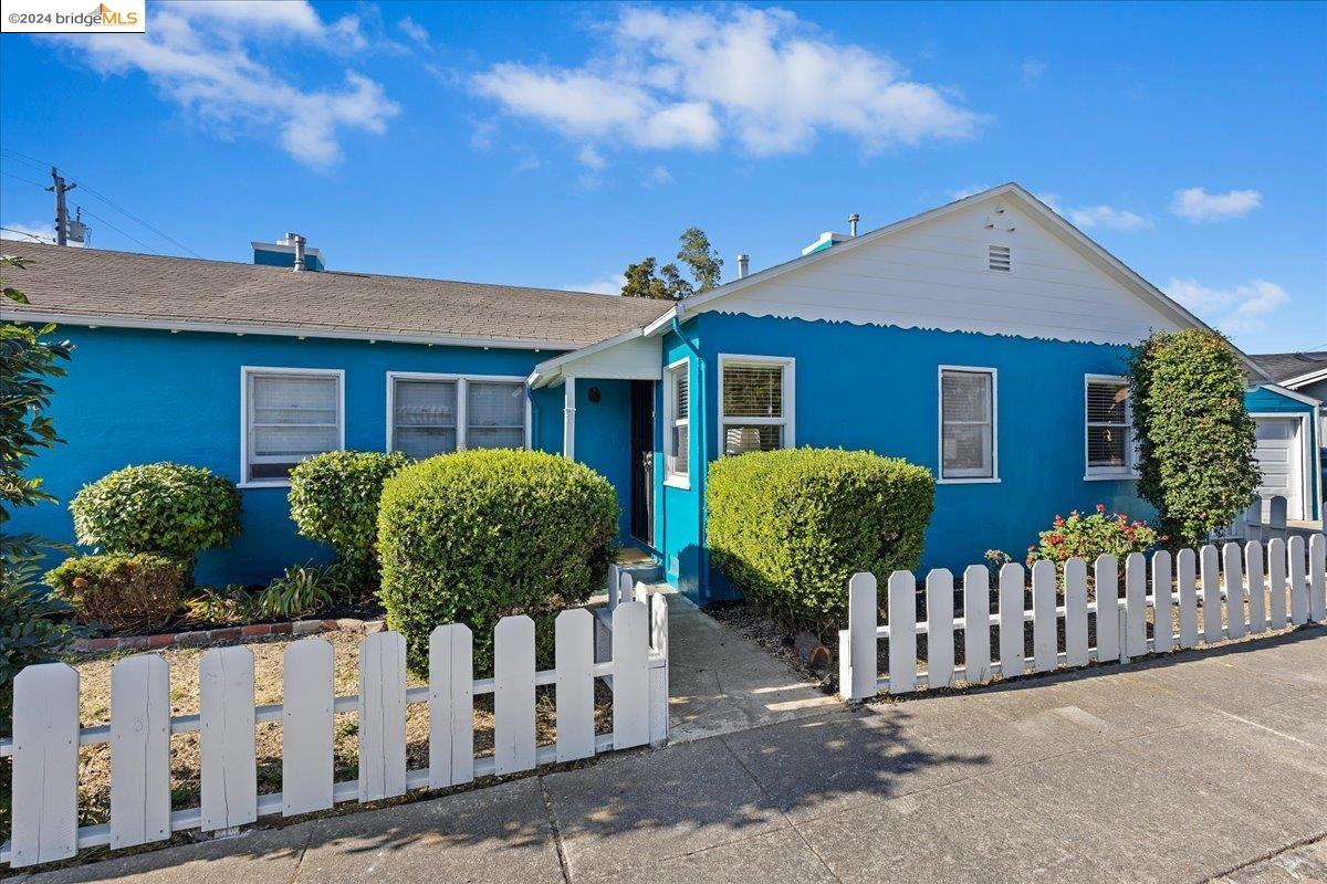 a front view of house yard and front view of house