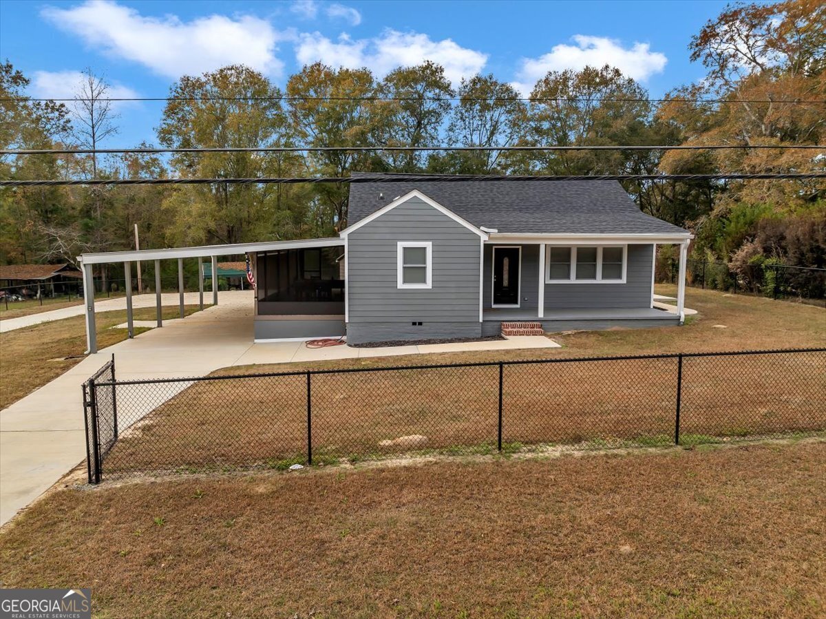 a view of a house with a park