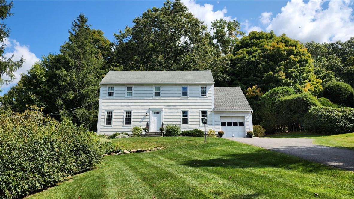 a view of a house with a big yard