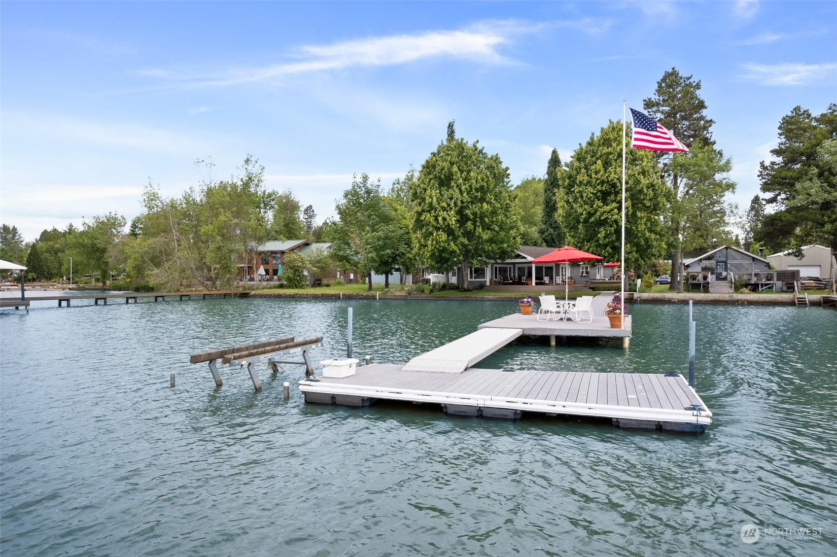 a view of a lake with sitting area