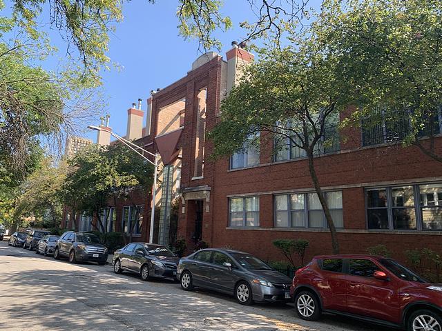 a car parked in front of a building