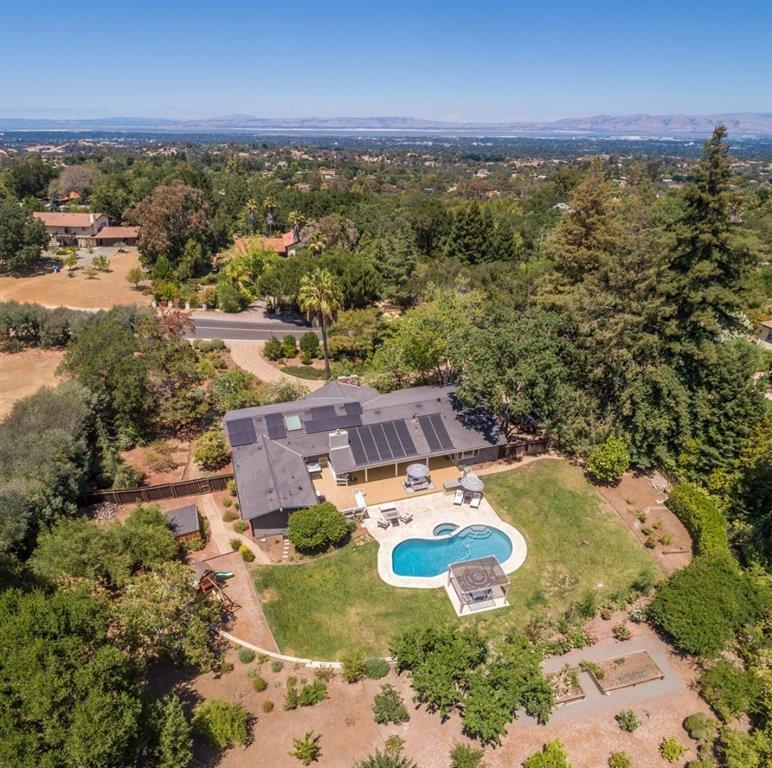 an aerial view of residential house with outdoor space