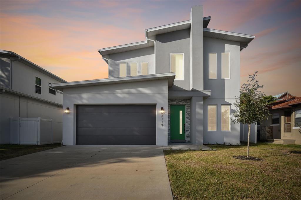 front view of a house with a garage