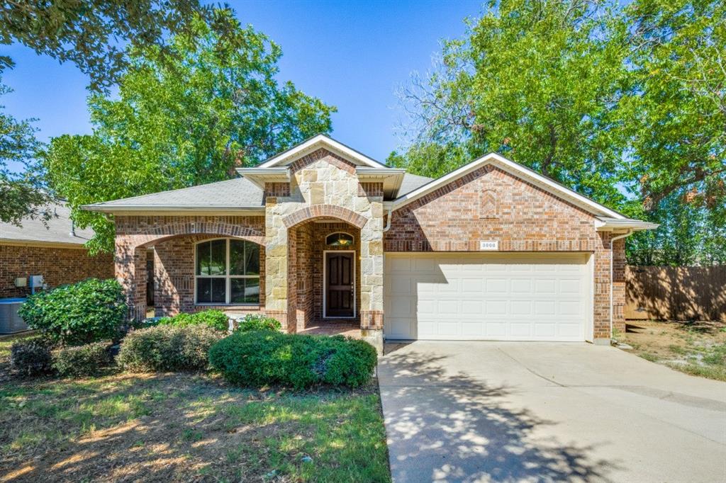 View of front of house with 2 car garage