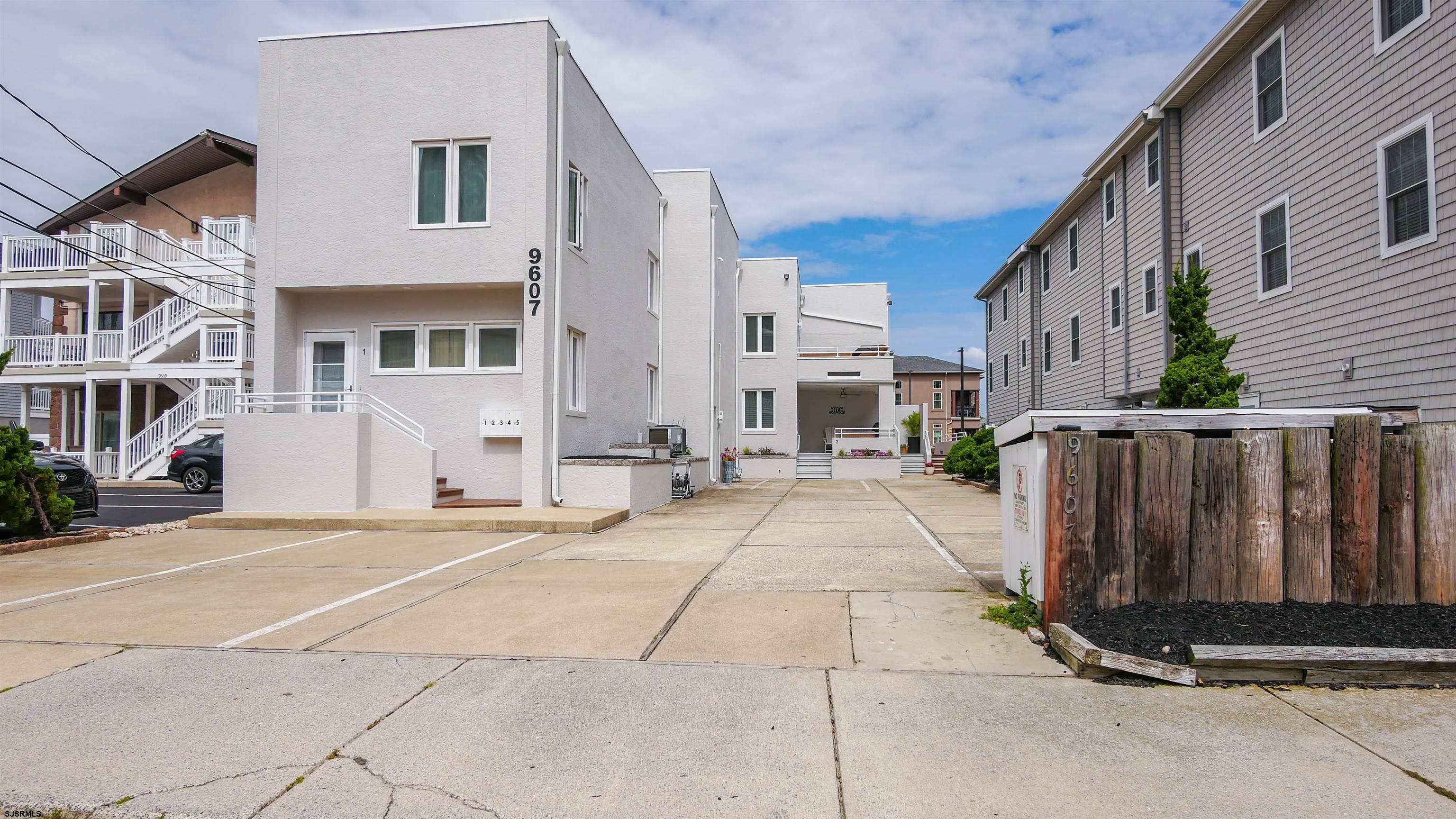 a view of a house with a street