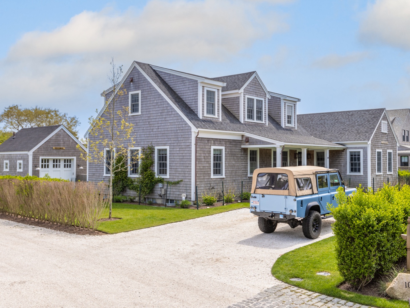 a house view with a garden space