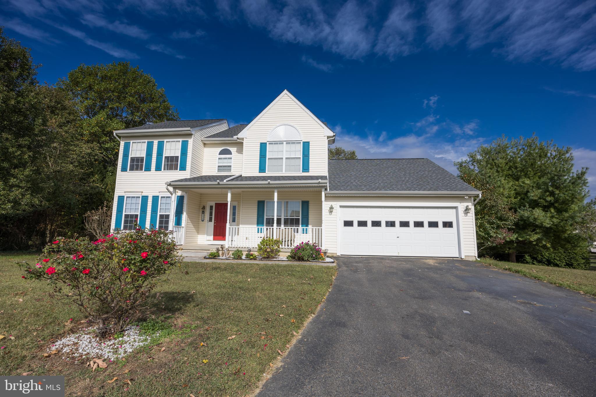 a front view of house with yard