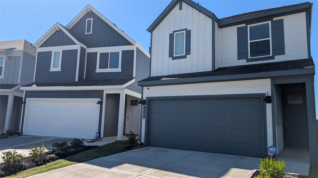  Modern two-story home featuring  attached two-car garage. 