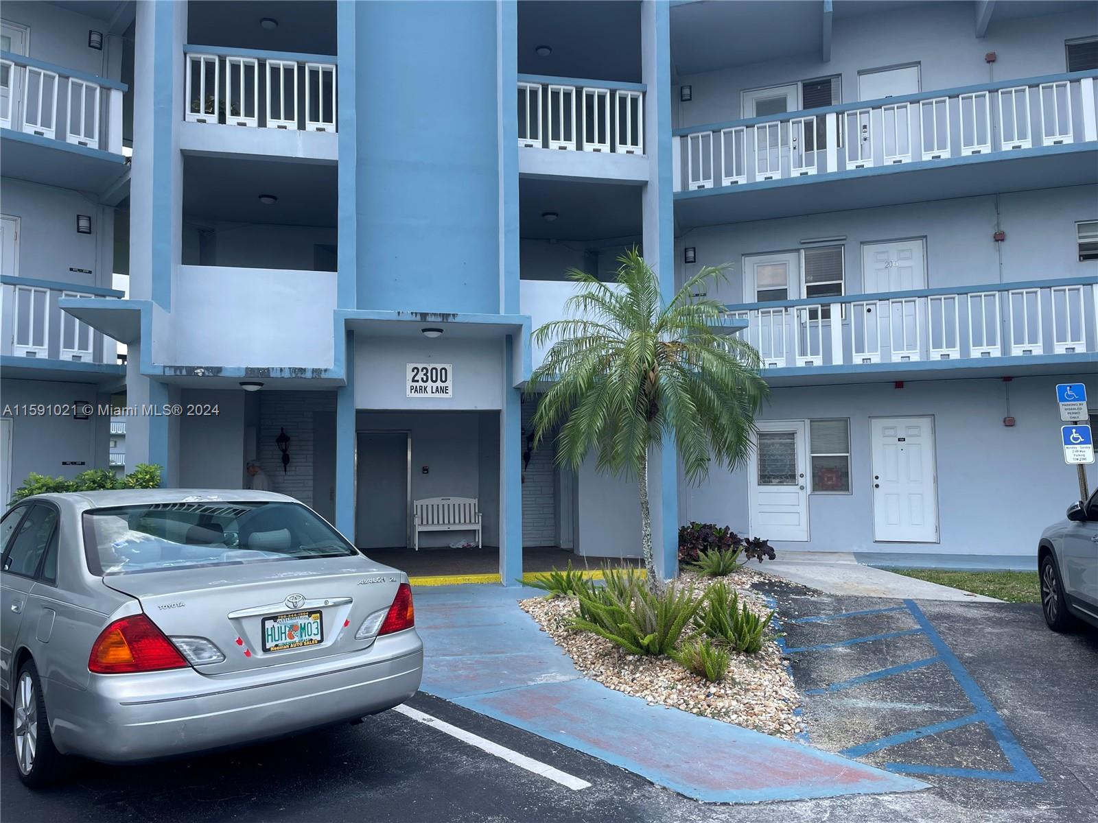 a car parked in front of a building