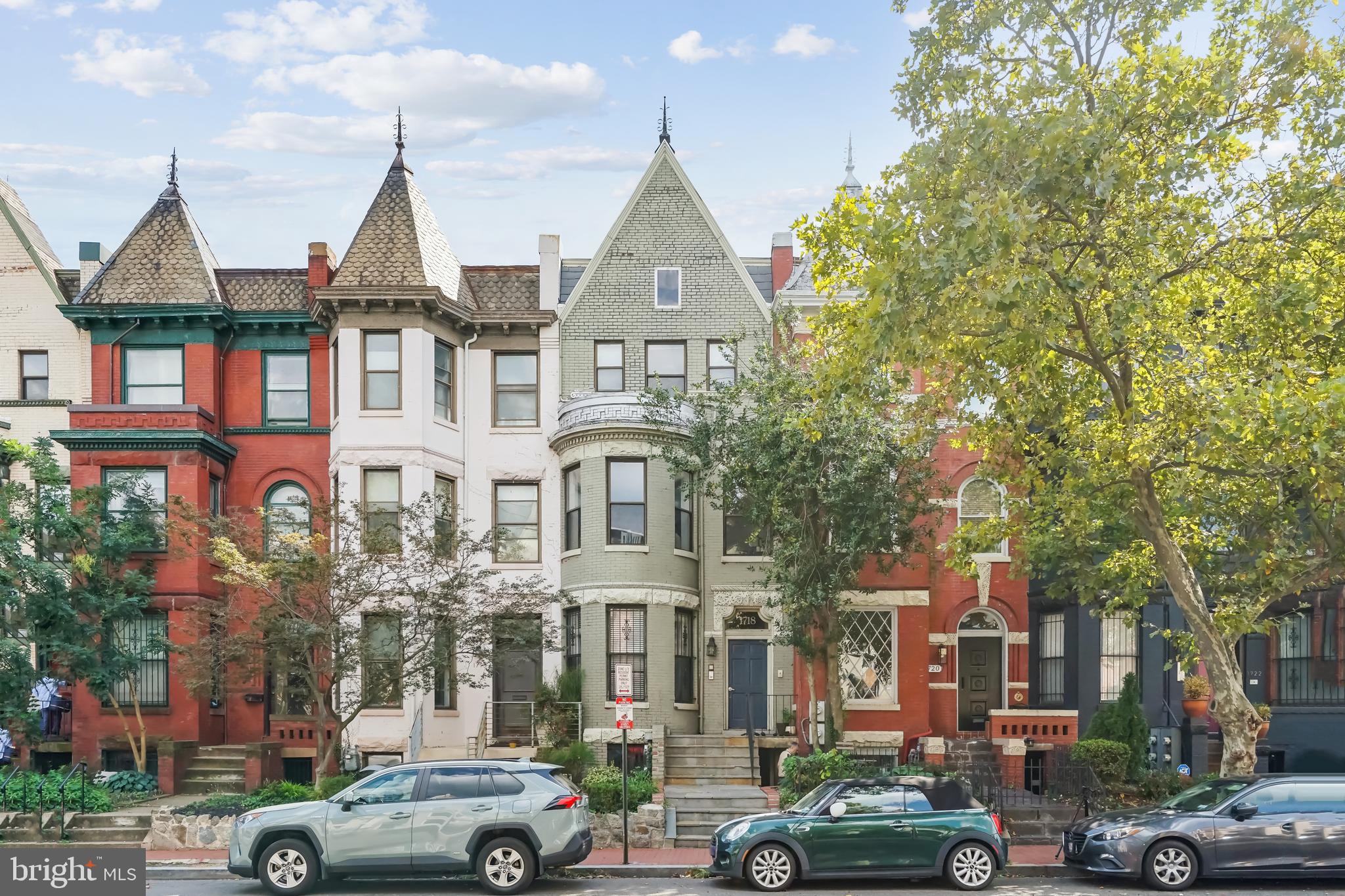 a view of multiple houses with a street