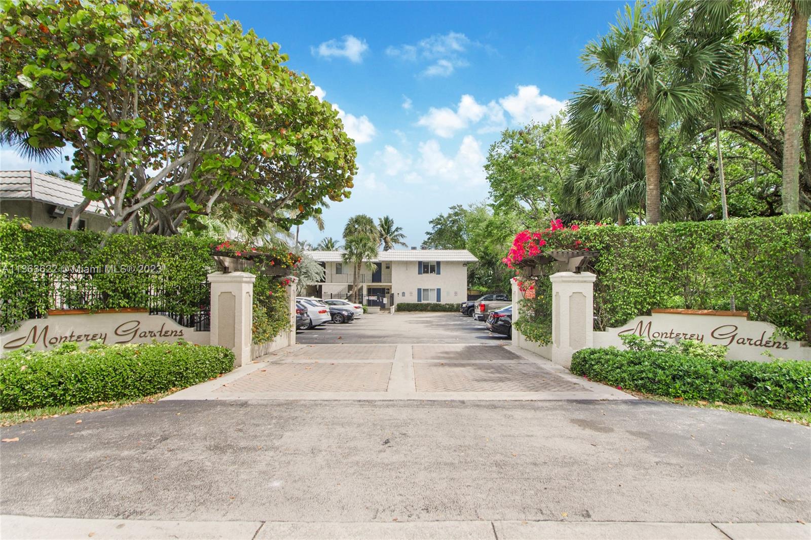 a front view of a house with a yard and a garage