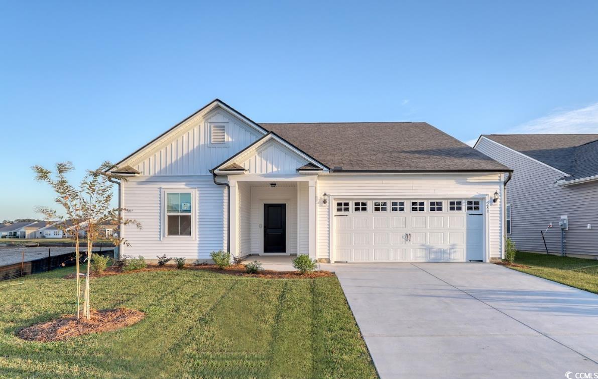 View of front of home featuring a front yard and a