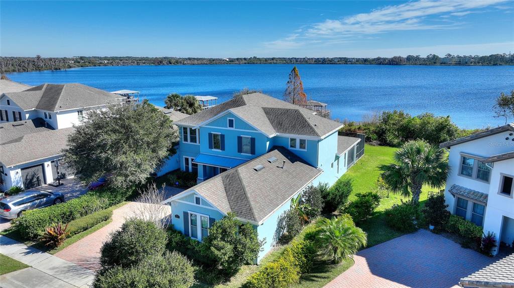 an aerial view of a house with a garden space