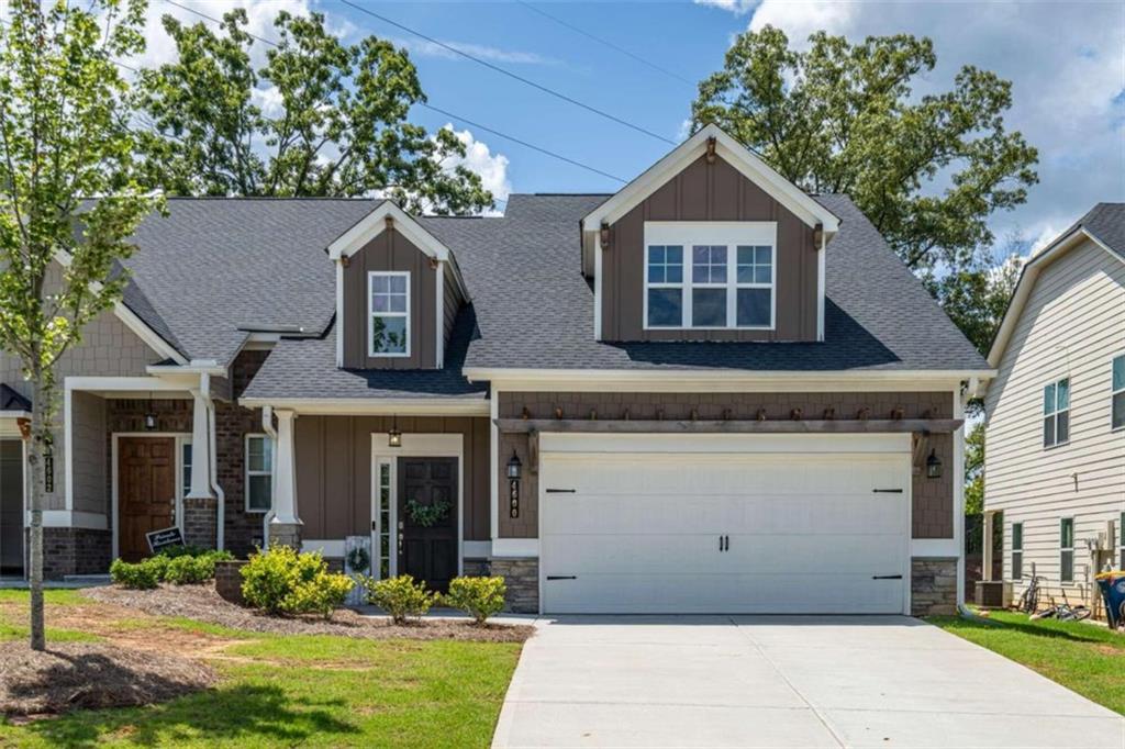 front view of a house with a yard