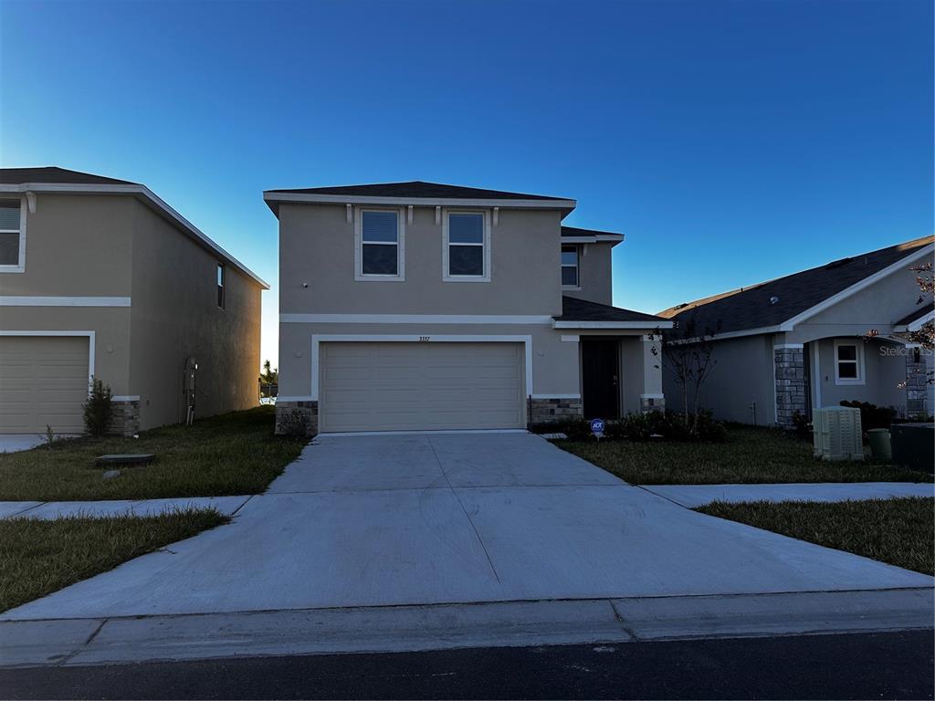 a front view of a house with yard