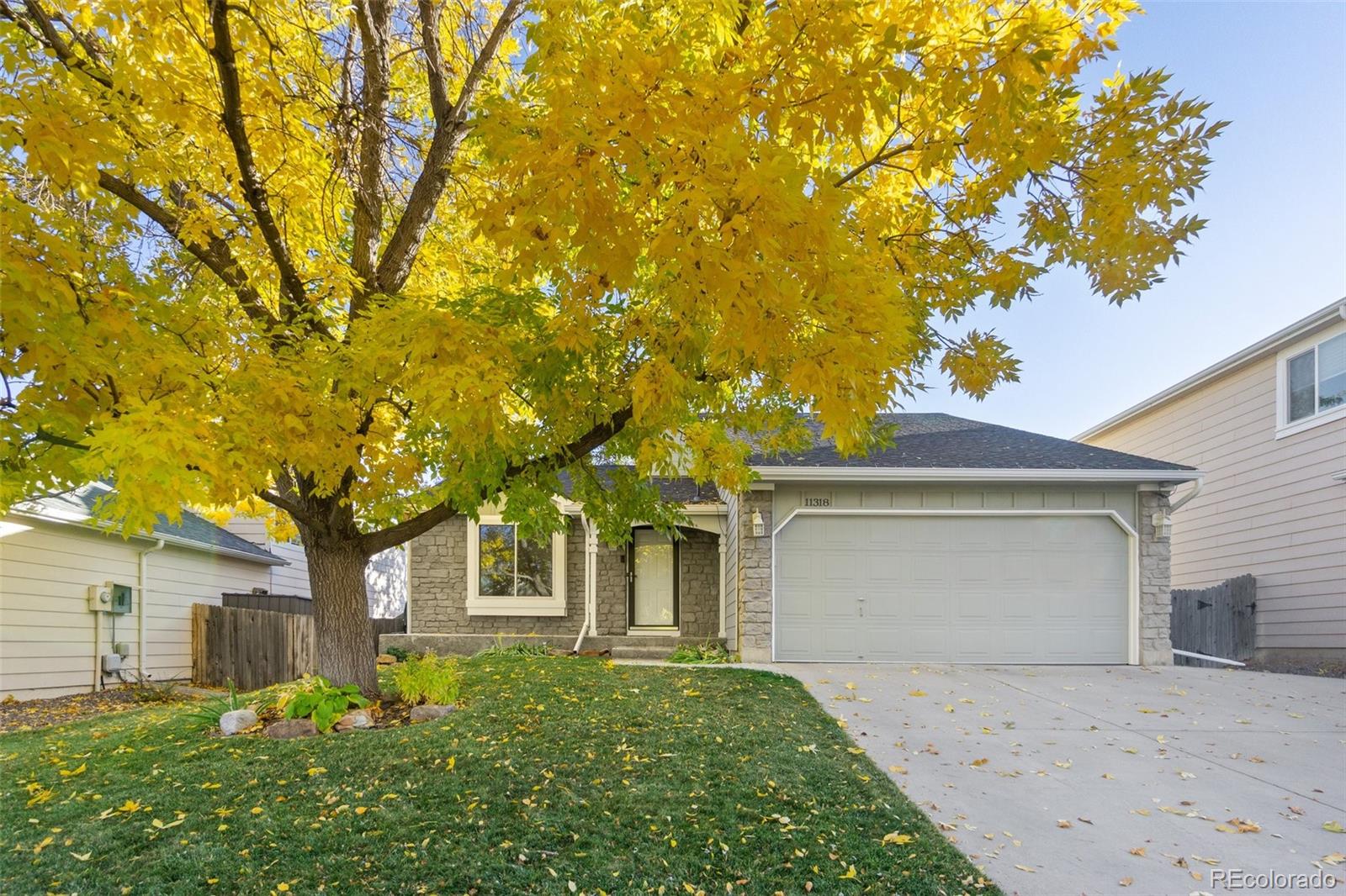 front view of a house with a big yard