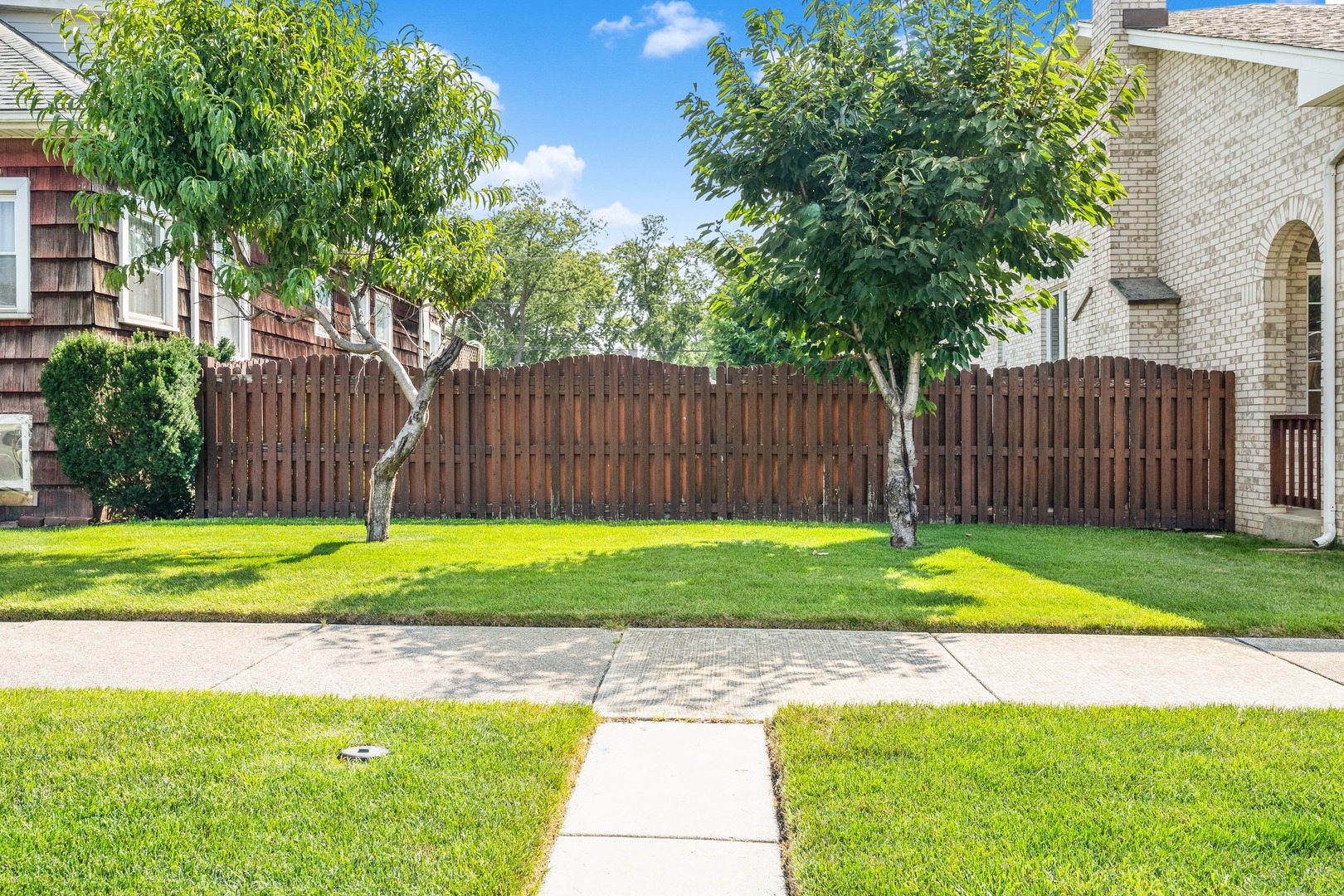 a view of a backyard with a garden