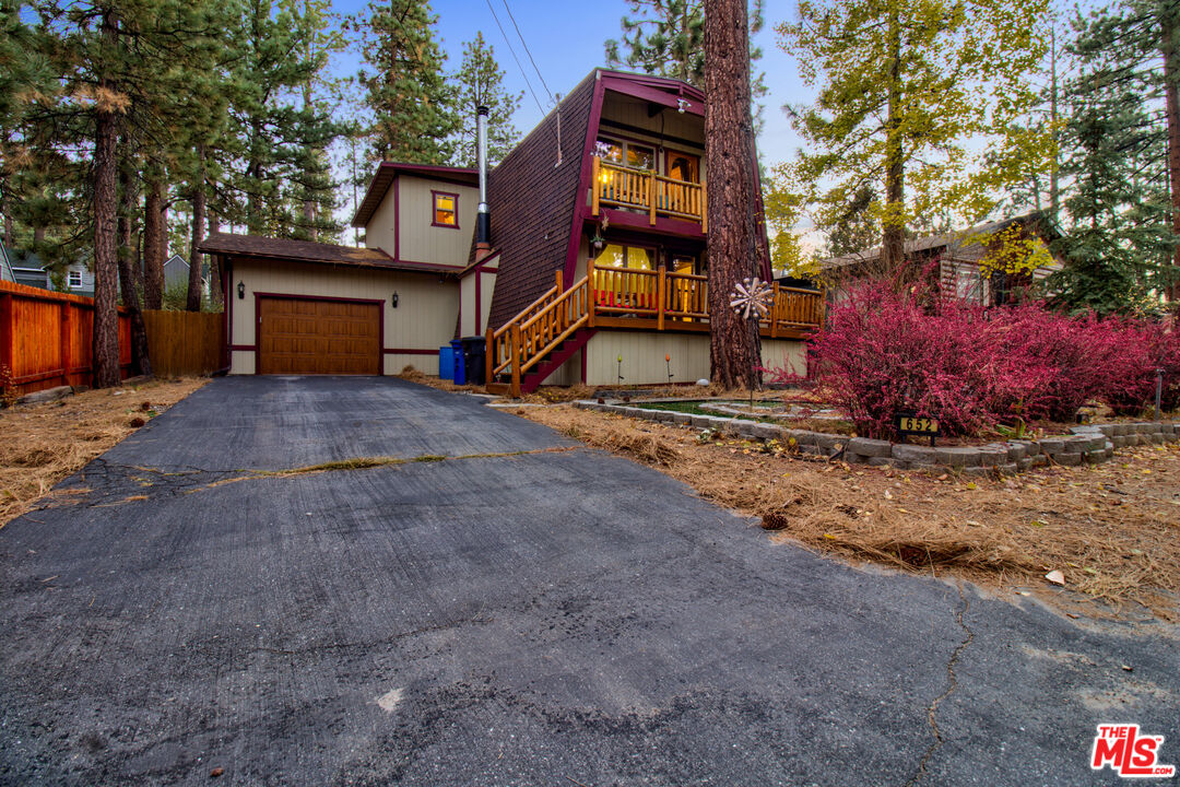 a house with trees in front of it