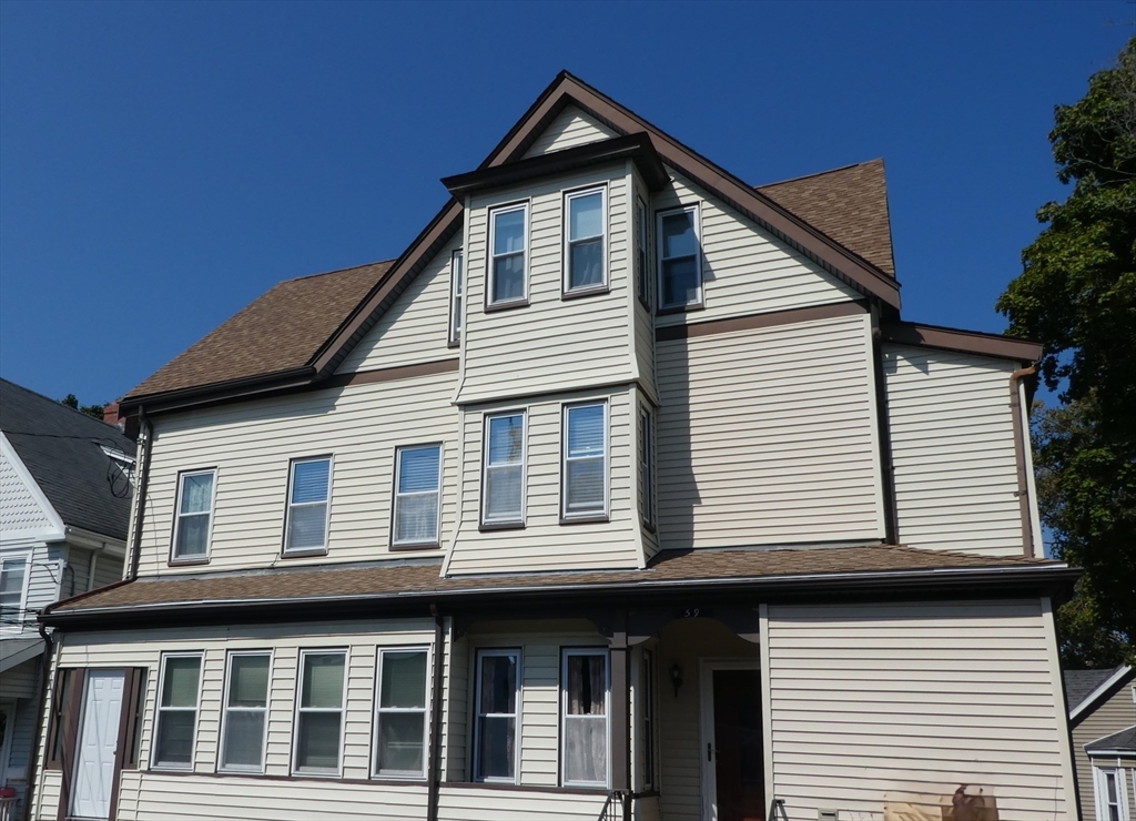 a front view of a house with a balcony