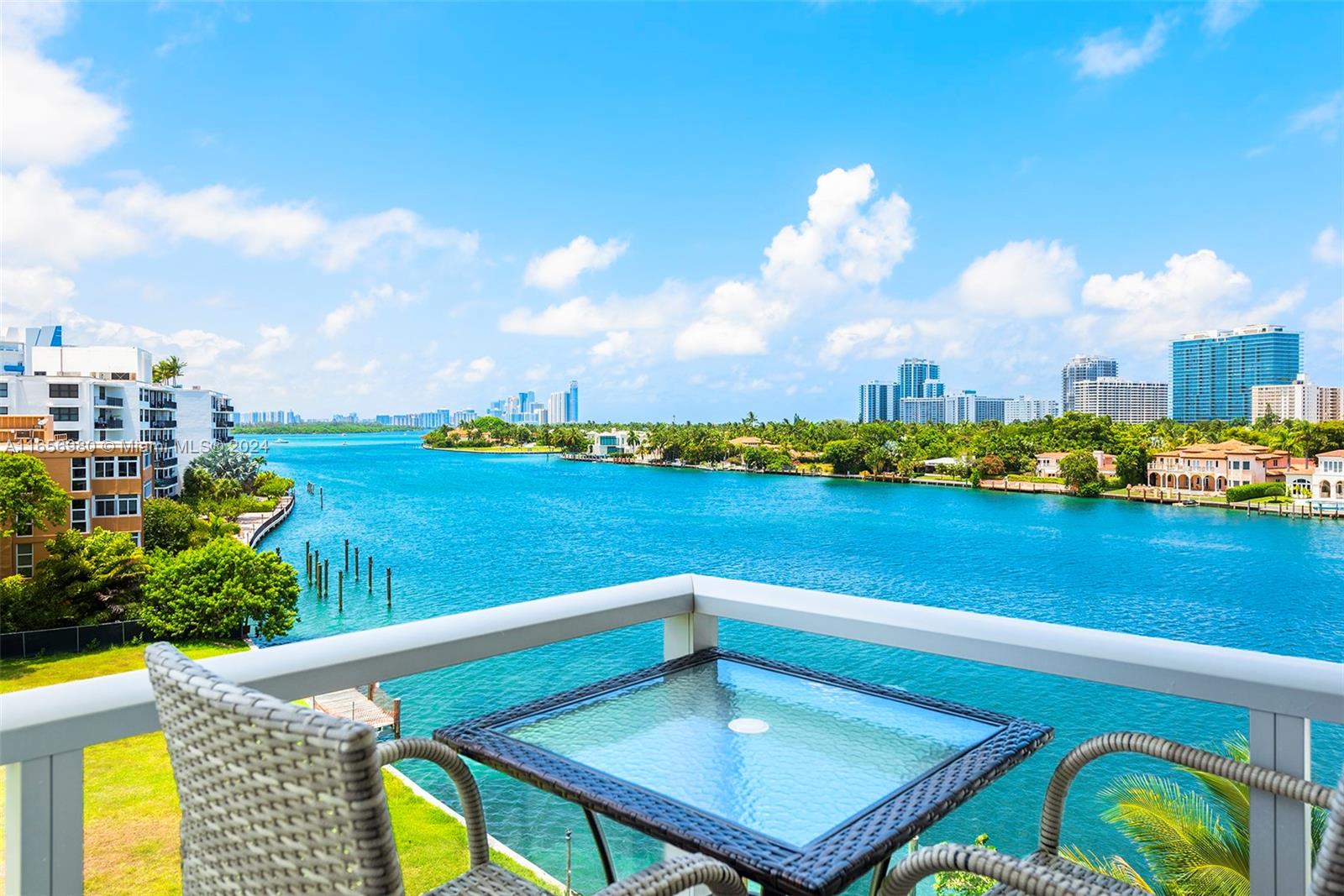 a view of a lake from a balcony