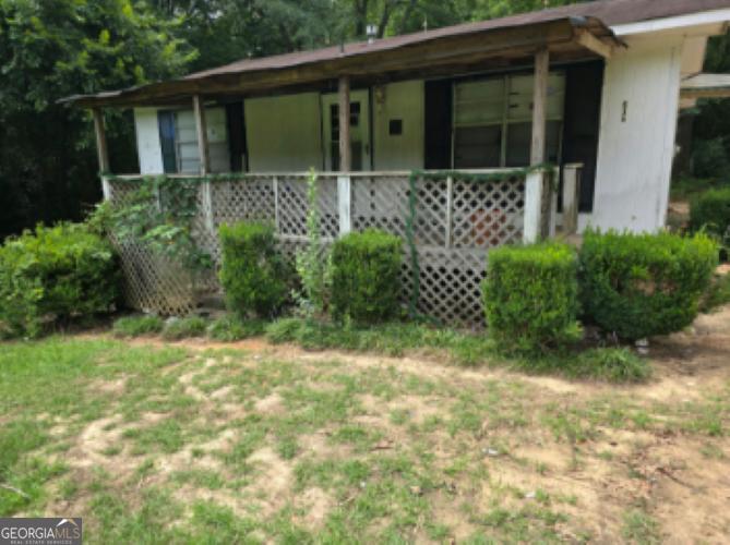 a view of a house with a garden