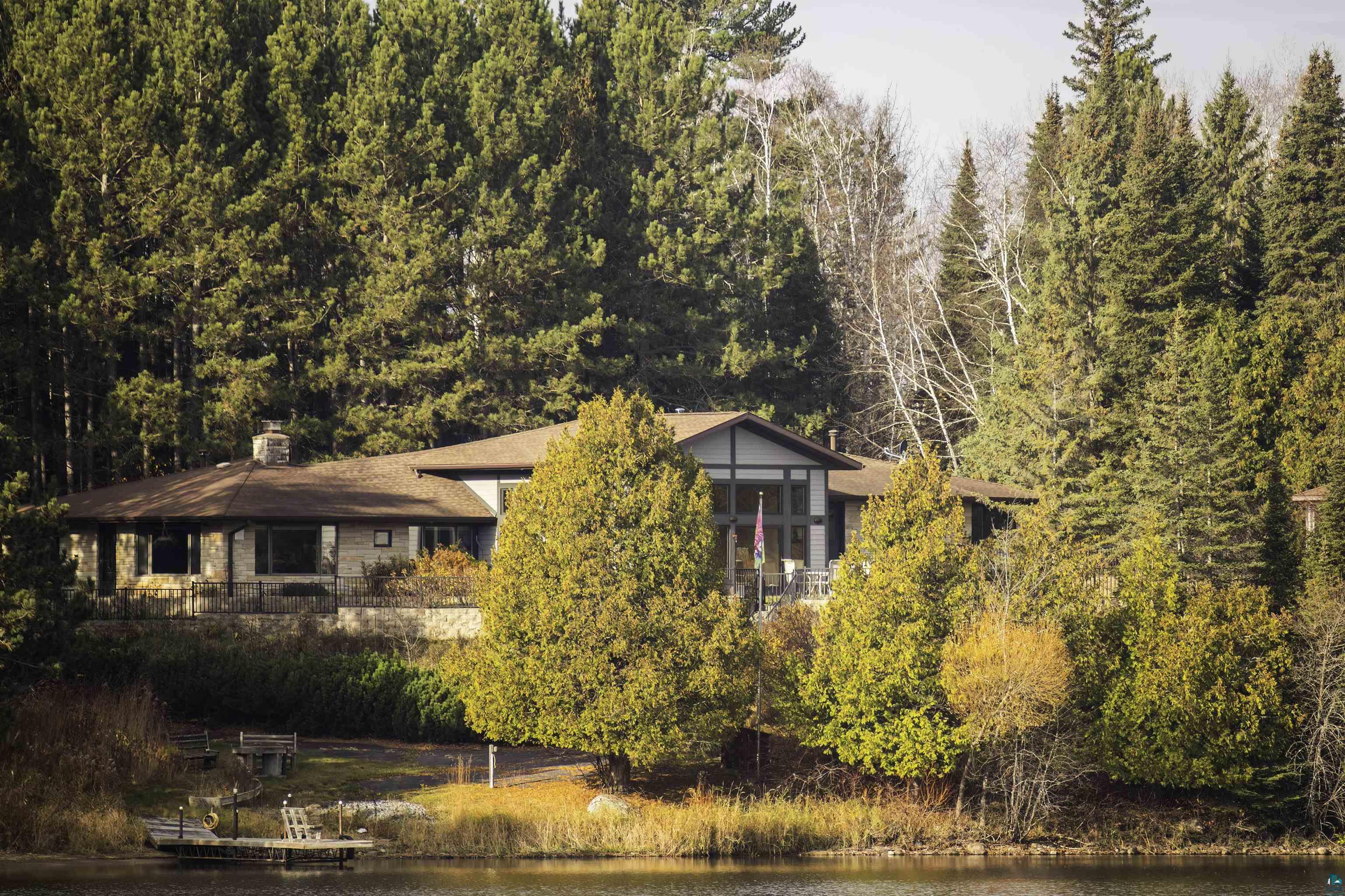 View of front of property featuring a water view