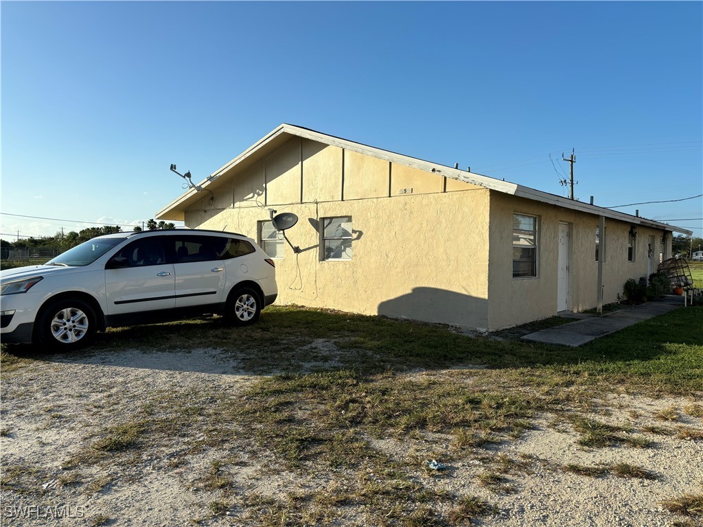 a car parked in front of a house