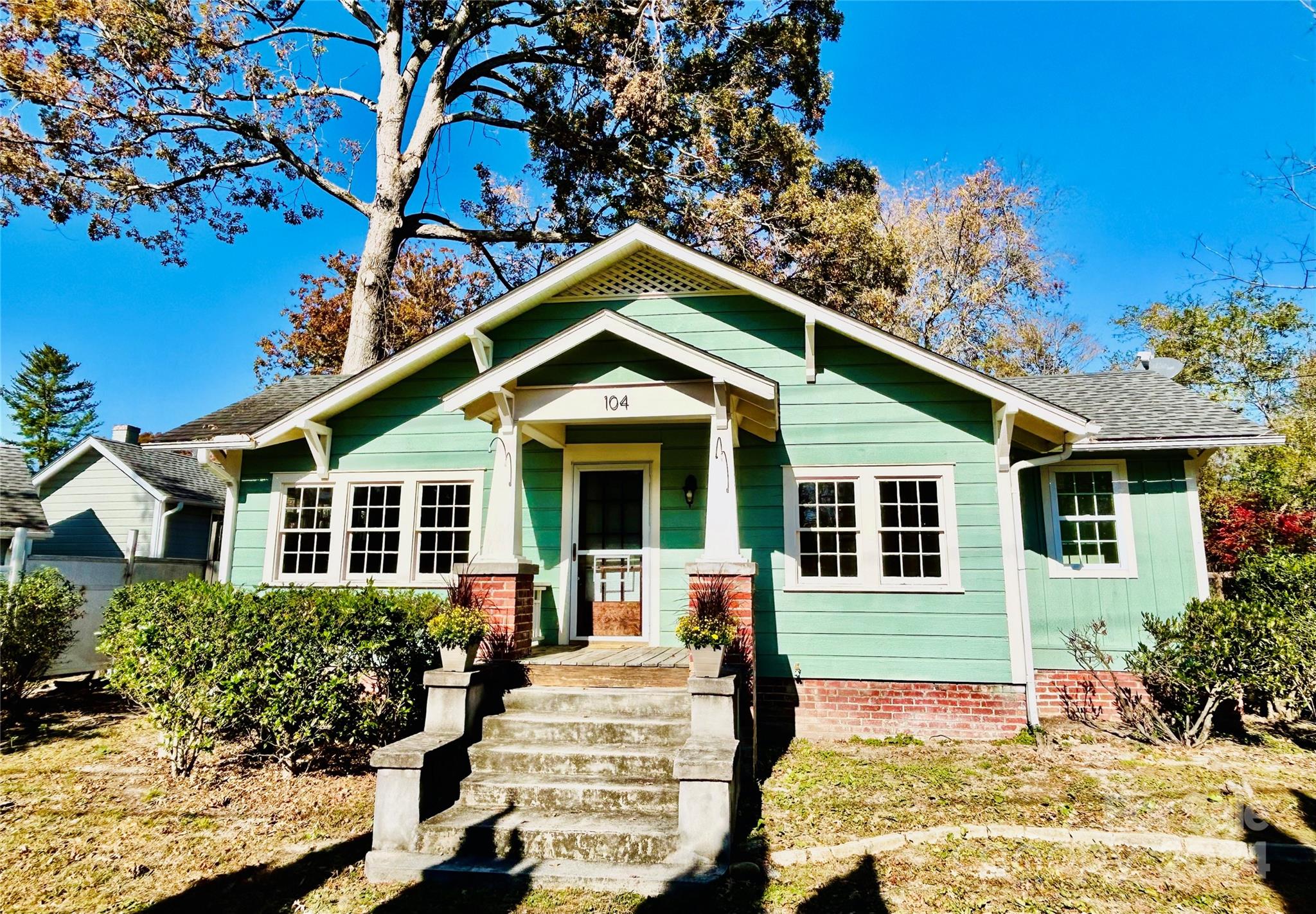 a front view of a house with a porch