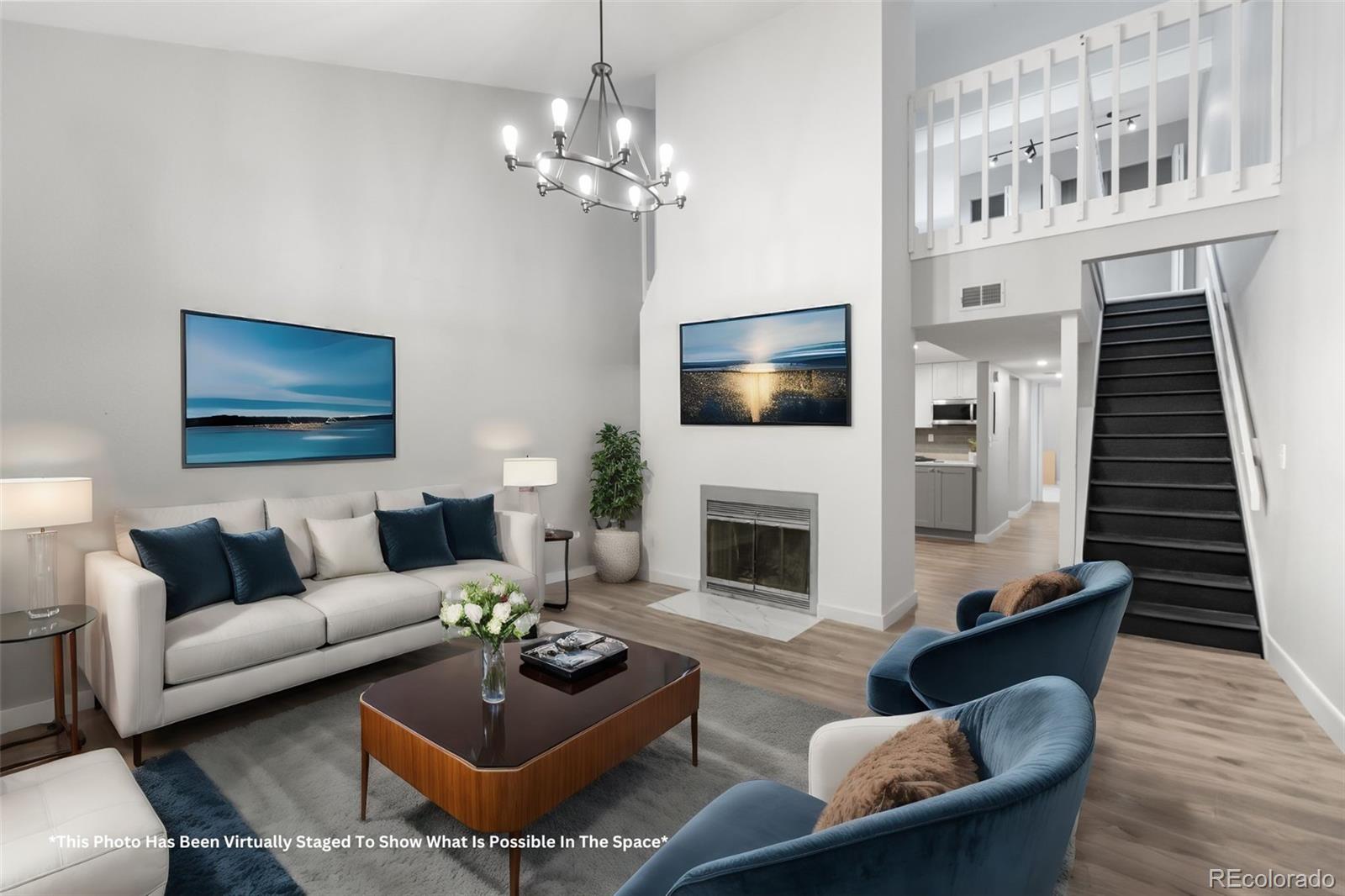 a living room with furniture a fireplace and a flat screen tv