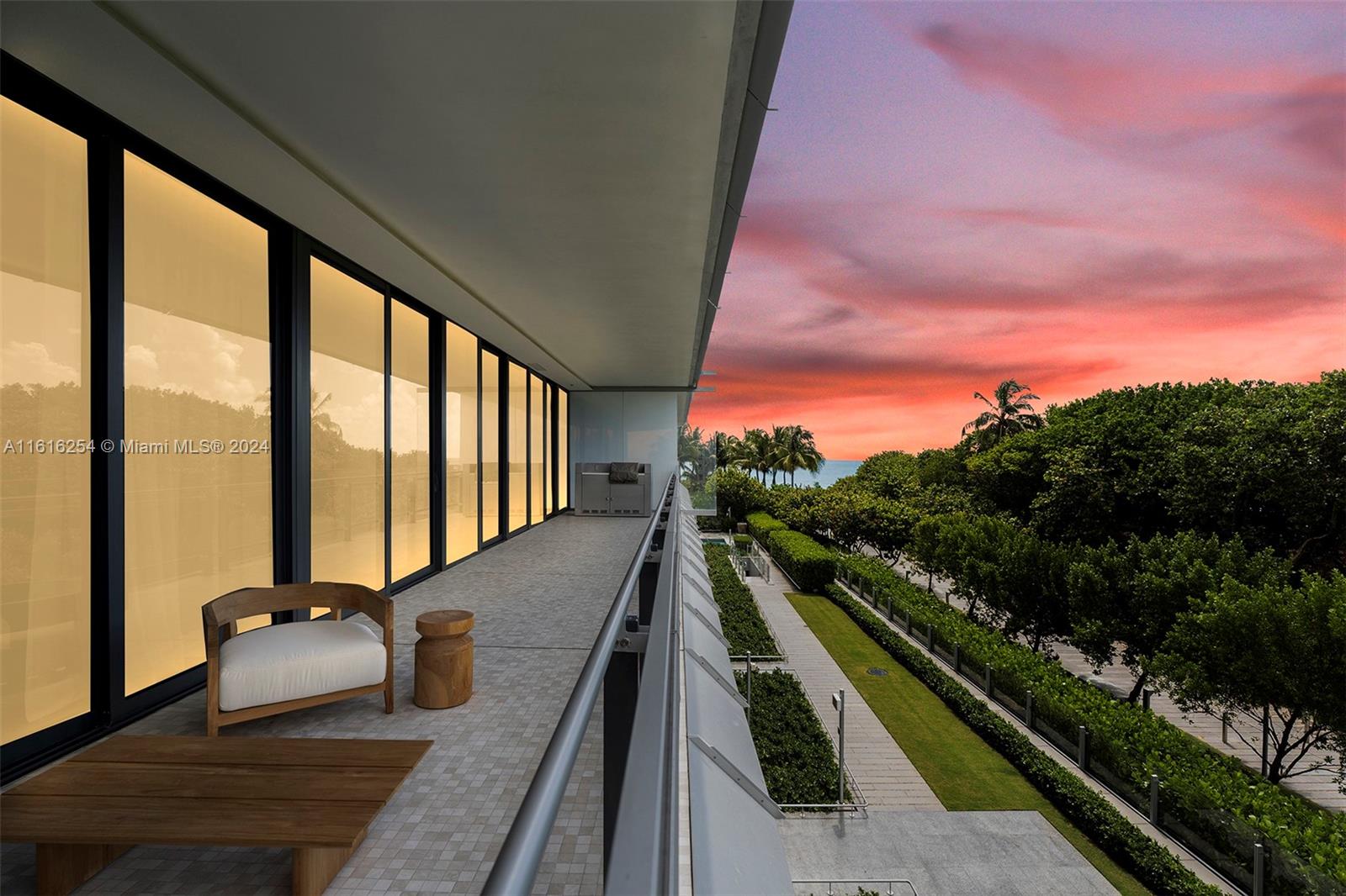 a view of balcony with couch and wooden floor