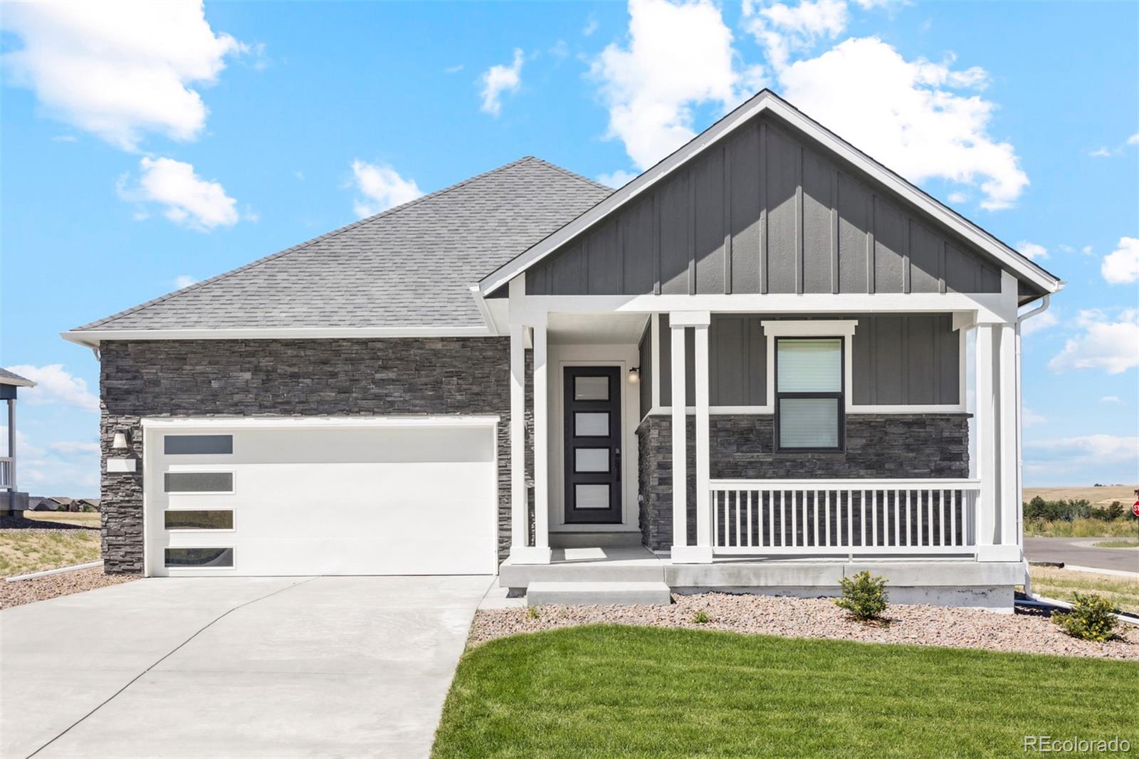 a front view of a house with a fence