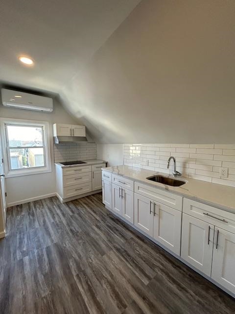 a kitchen with sink cabinets and window