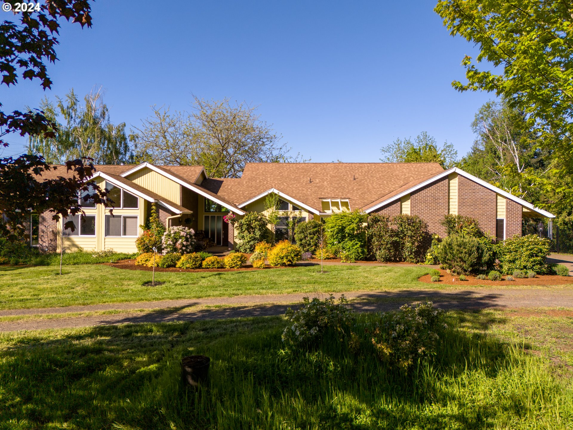 a view of an house with backyard and outdoor space