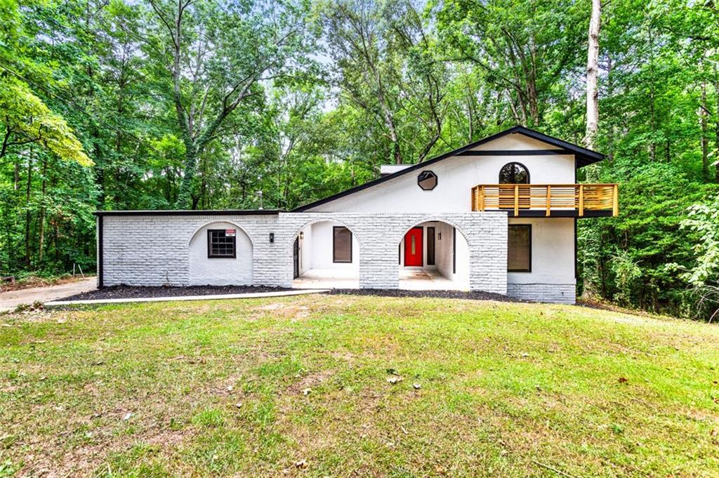 a front view of house with yard